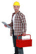 Builder holding clip-board and tool box