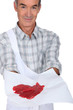 Butcher showing meat on white  background