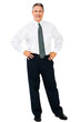 Businessman standing with arms akimbo