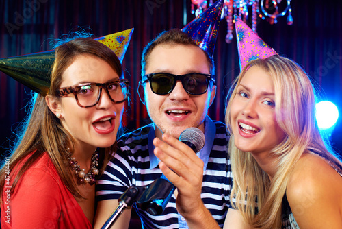 Photo: Singing at party Singing at party