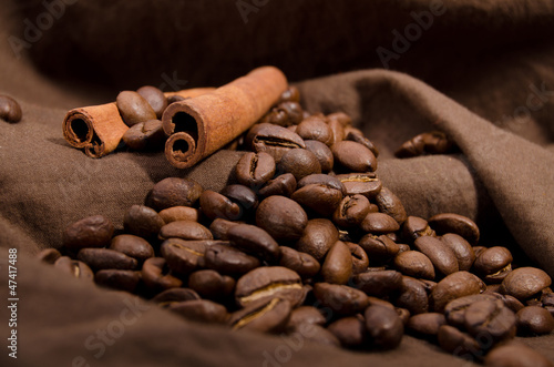 Photo: coffee beans and cinnamon coffee beans and cinnamon