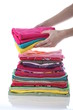 Woman laying down laundry