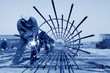reinforced component at the construction site and workers
