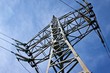 Photo: Electricity pylon against blue cloudy sky Electricity pylon against blue cloudy sky