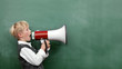 Boy with Megaphone at the Blackboard