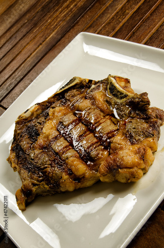 Photo: Grilled beef steak with bone Grilled beef steak with bone