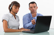 Business couple with a laptop