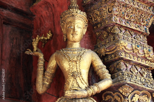 Photo: Kinnari decorated on the door at Wat Phra Sing Kinnari decorated on the door at Wat Phra Sing