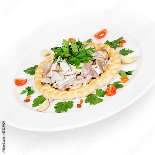 Photo: meat salad. isolated on white background meat salad. isolated on white background