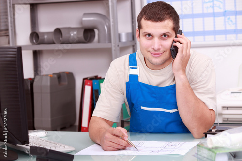 Photo: Plumbers merchant on the telephone Plumbers merchant on the telephone