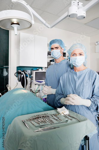 Photo: Veterinarian Surgeons In Operating Room Veterinarian Surgeons In Operating Room