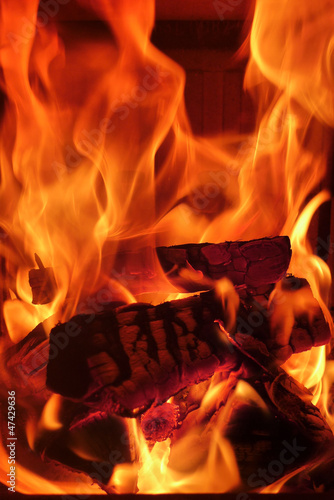 Photo: Feuer im Kachelofen Feuer im Kachelofen
