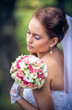 Photo: shot of a beautiful caucasian bride outdoor shot of a beautiful caucasian bride outdoor
