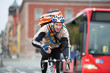 Photo: Male Cyclist With Courier Delivery Bag Riding Bicycle Male Cyclist With Courier Delivery Bag Riding Bicycle