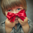 Small baby with silver gift box