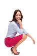 Businesswoman crouching