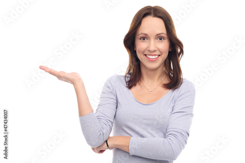 Photo: Attractive woman presenting something Attractive woman presenting something
