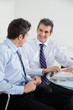 Happy Businessmen In A Meeting