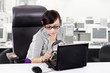 Focus business woman using magnifying glass