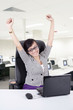 Happy Businesswoman with her laptop