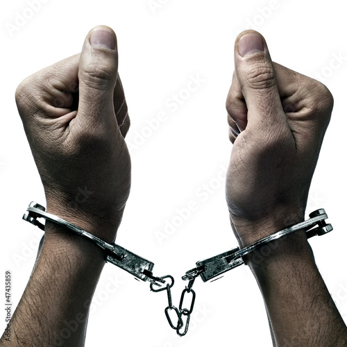 Photo: handcuffed man handcuffed man