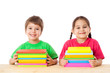 Kids with pile of books