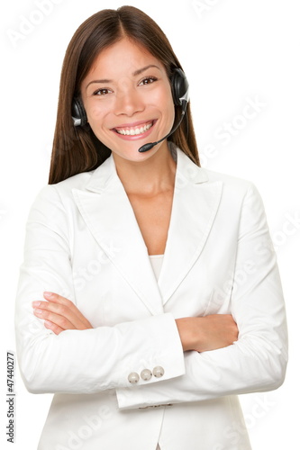 Photo: Cheerful Asian call operator Cheerful Asian call operator