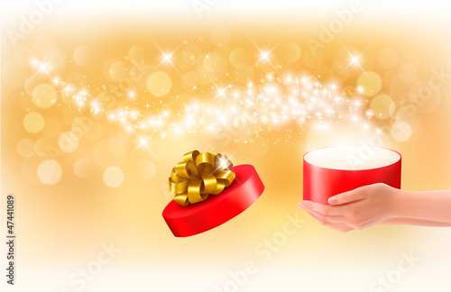 Vector: Christmas background with gift magic box. Concept of giving pres Christmas background with gift magic box. Concept of giving pres