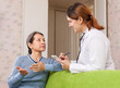  mature woman tells the doctor the symptoms