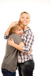 Happy young friends giving each other a hug