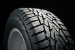 part of winter tire on black