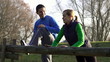 Young happy couple exercising outdoors