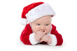 Seven-month-old baby in Santa Claus outfit
