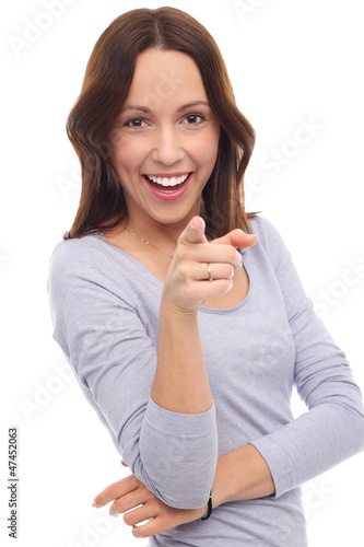 Photo: Attractive woman pointing at you Attractive woman pointing at you