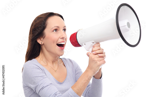 Photo: Woman shouting through megaphone Woman shouting through megaphone