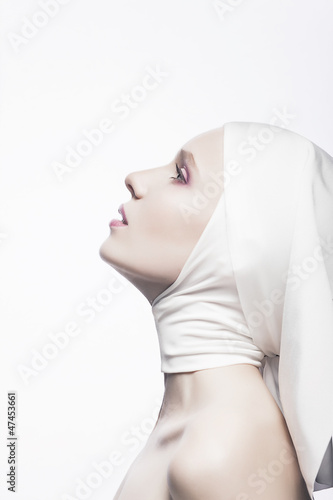 Photo: Grace. Cult. Praying Religious Woman - Church Concept Grace. Cult. Praying Religious Woman - Church Concept