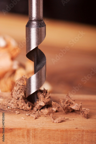 Photo: Auger bit drilling wood Auger bit drilling wood