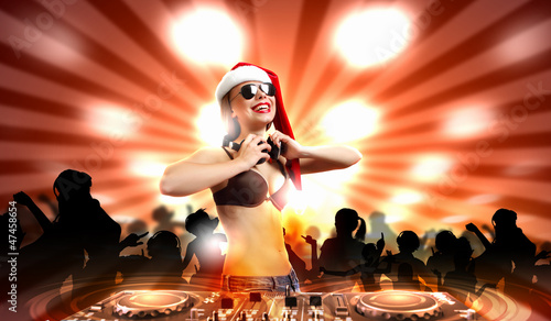 Photo: Female dj in christmas wear Female dj in christmas wear