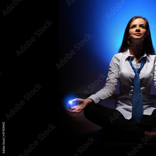 Photo: Business woman meditating Business woman meditating