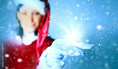 Photo: Portrait of girl wearing santa claus clothes Portrait of girl wearing santa claus clothes