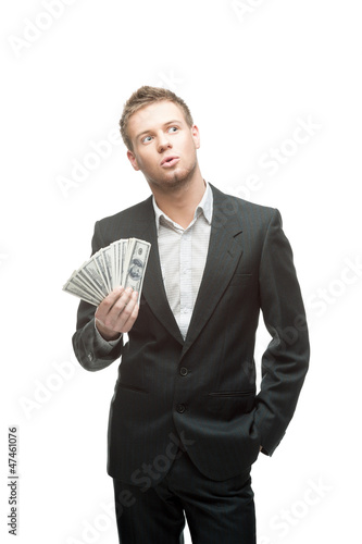 Photo: cheerful businessman holding money cheerful businessman holding money