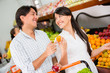 Couple grocery shopping