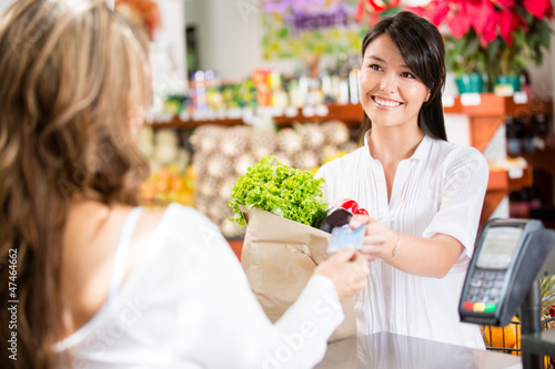 Photo: Shopping woman at the checkout Shopping woman at the checkout