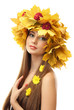 beautiful young woman with yellow autumn wreath, isolated