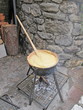 cauldron over the fire with creamy corn called polenta