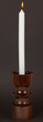 Old antique wooden candlestick candleholder with vintage candle
