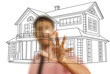 Businessman pushing house plan on the white board.