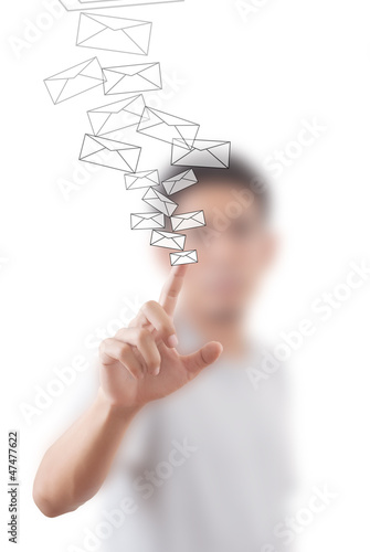 Photo: Businessman pushing mail for social network. Businessman pushing mail for social network.