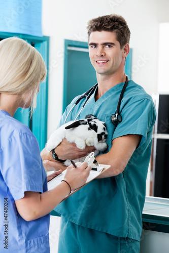 Photo: Veterinarian Doctor With Rabbit Veterinarian Doctor With Rabbit