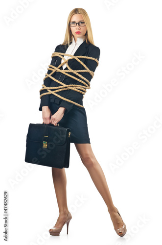 Photo: Tied woman in business concept Tied woman in business concept